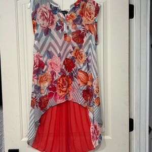 Ladies floral high/low sheer top with pleats